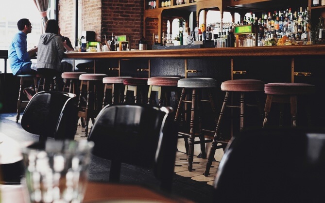 view of bar with barstools